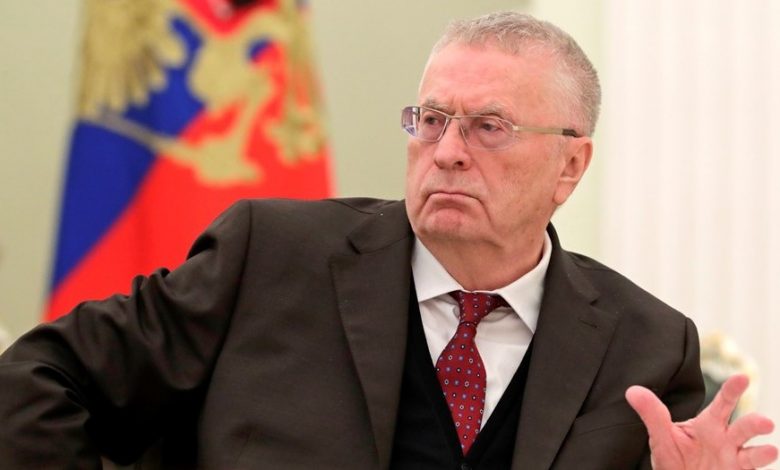Лидер ЛДПР Жириновский на фоне флага России